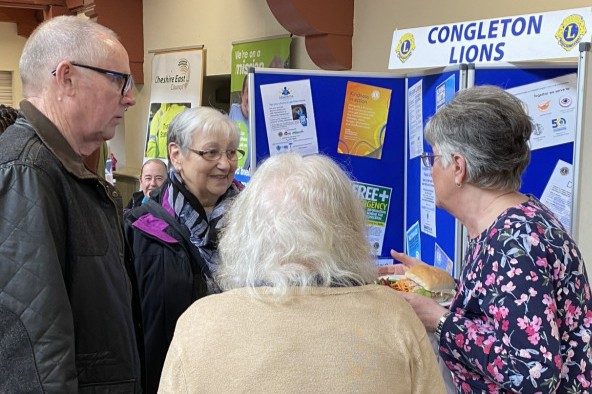 Members of the public speaking to a Congleton Lions volunteer Members of the public speaking to a Congleton Lions volunteer